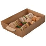 Kraft medium platter base with handle. Filled with a variety of sandwich triangles, bread rolls, salad, and tomatoes.