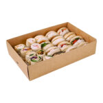 Small kraft platter base, filled with wraps and bread rolls.