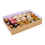 Medium kraft platter base, with kraft exterior and white interior, filled with a mixture of snacks including cupcakes, bread rolls, sausage rolls and wraps.