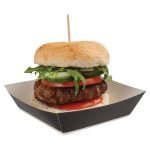 Medium black tray with white interior, filled with a burger including a sesame seed bun, beef patty, sliced tomatoes, sliced cucumber, white onions, and rocket.